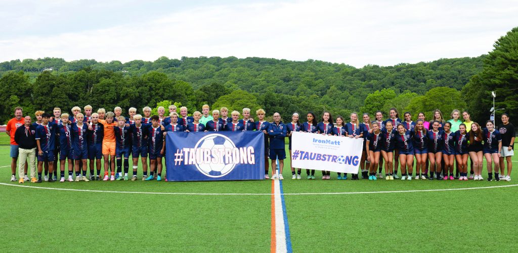 Taubstrong yearbook picture of the boys and girls Greeley soccer teams