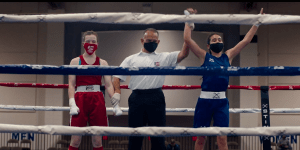 JessZilla in the boxing ring after winning a match