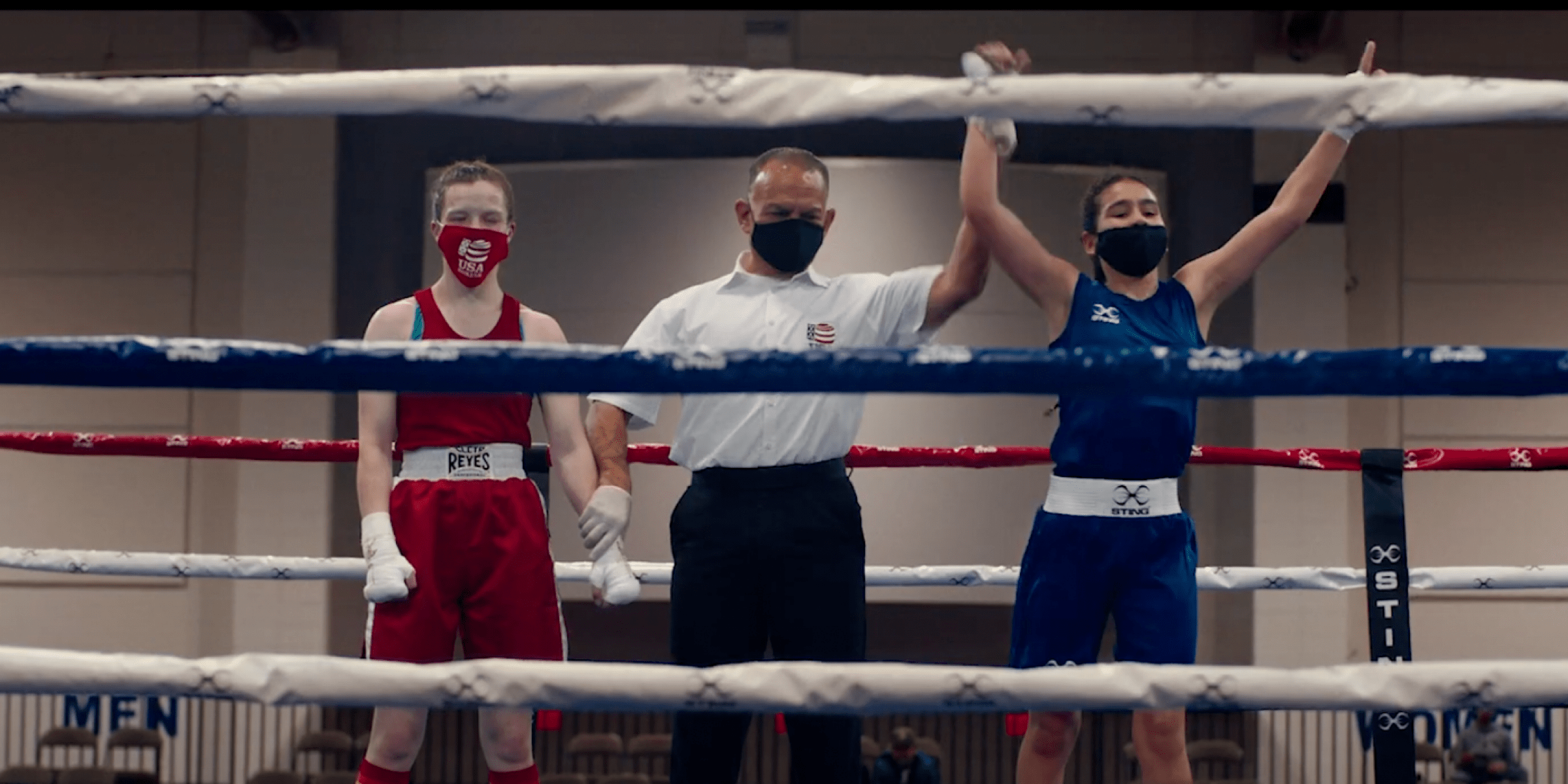 JessZilla in the boxing ring after winning a match