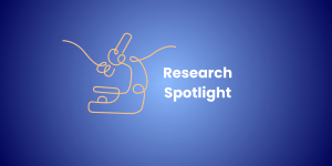 doodle of a microscope with the words, research spotlight